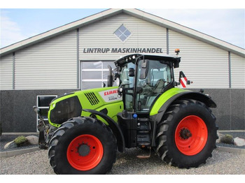 CLAAS AXION 870 CMATIC med frontlift og front PTO, GPS r  - Farm tractor: picture 1