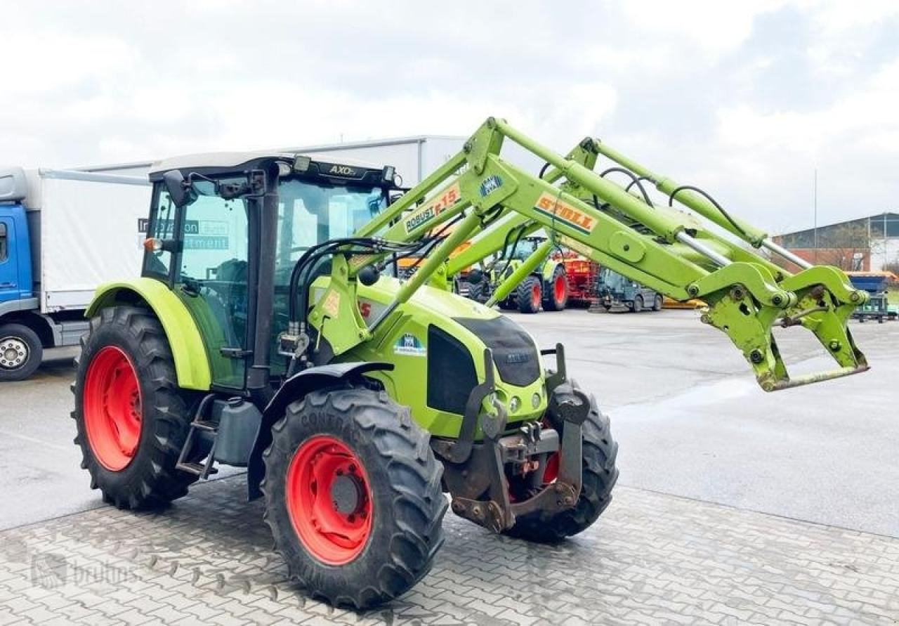 CLAAS axos 320 mit stoll frontlader - Farm tractor: picture 1