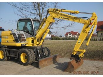 New Wheel excavator NEW HOLLAND MH2,6: picture 1