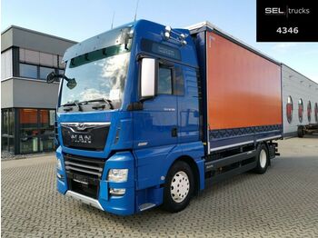 Curtainsider truck MAN TGX 18.580 4x2 LL /LEDER/D38/Navi/Standklima: picture 1