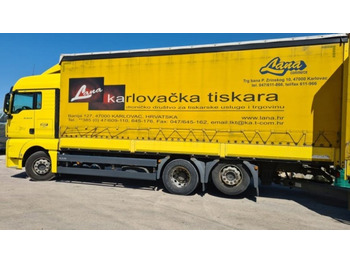 Curtainsider truck MAN TGX 26.440: picture 3