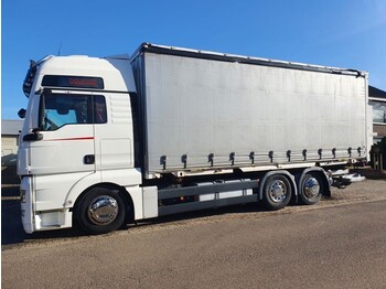 Container transporter/ Swap body truck MAN TGX 26.440: picture 1