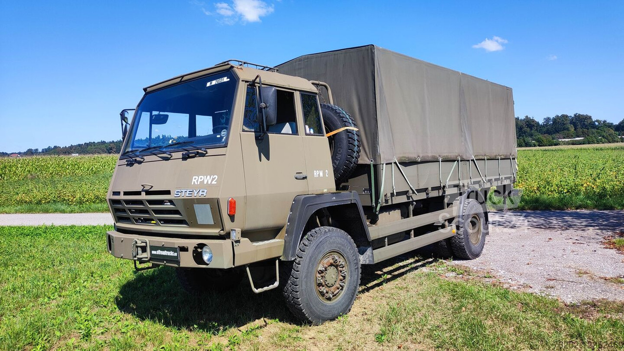 Steyr 1291.320 P43M 4x4 mit Hebebühne - Curtainsider truck: picture 1