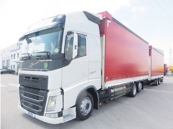 Curtainsider truck Volvo FH500 6x2 tandem jumbo 7.3+8.2m: picture 1