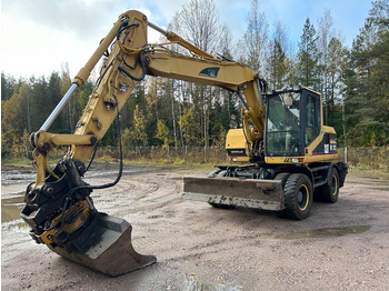 Wheel excavator CATERPILLAR M312
