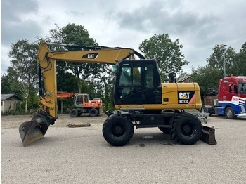 Wheel excavator CATERPILLAR M313D