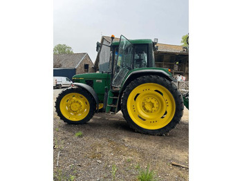 Farm tractor JOHN DEERE 6910