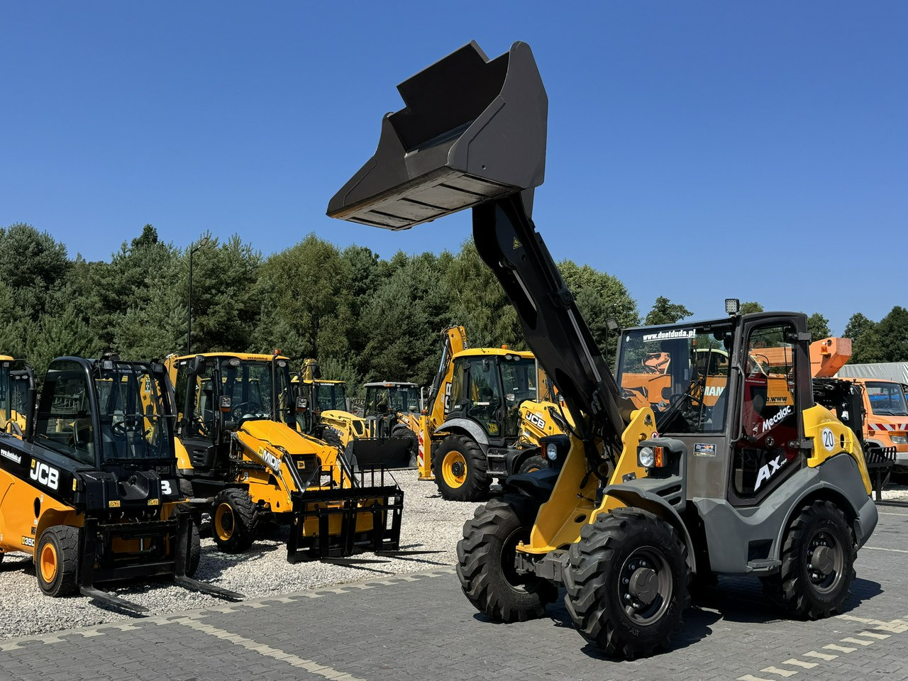 Mecalac AX 700 Szybko-Złącze Łyżka Super Stan - Wheel loader: picture 1 Mecalac AX 700 Szybko-Złącze Łyżka Super Stan - Wheel loader: picture 1