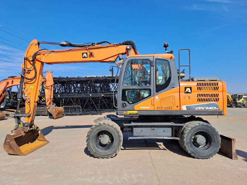 Doosan DX140W-5 - Wheel excavator: picture 1 Doosan DX140W-5 - Wheel excavator: picture 1