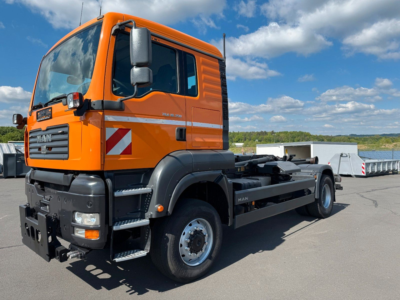 MAN TGA 18.350 4x4 Meiler Abroller RK 14.45 Winterd. - Hook lift truck: picture 1 MAN TGA 18.350 4x4 Meiler Abroller RK 14.45 Winterd. - Hook lift truck: picture 1