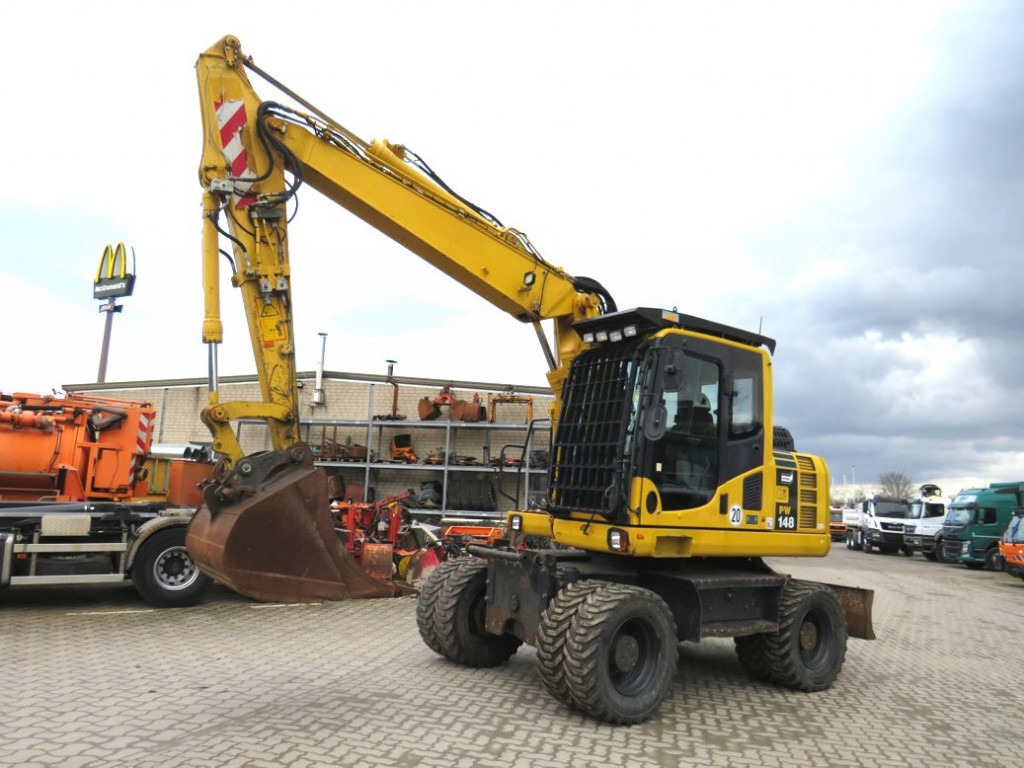 KOMATSU HANOMAG Mobilbagger PW 148 - 8 Bagger 6.824h Deutsch top - Wheel excavator: picture 1 KOMATSU HANOMAG Mobilbagger PW 148 - 8 Bagger 6.824h Deutsch top - Wheel excavator: picture 1