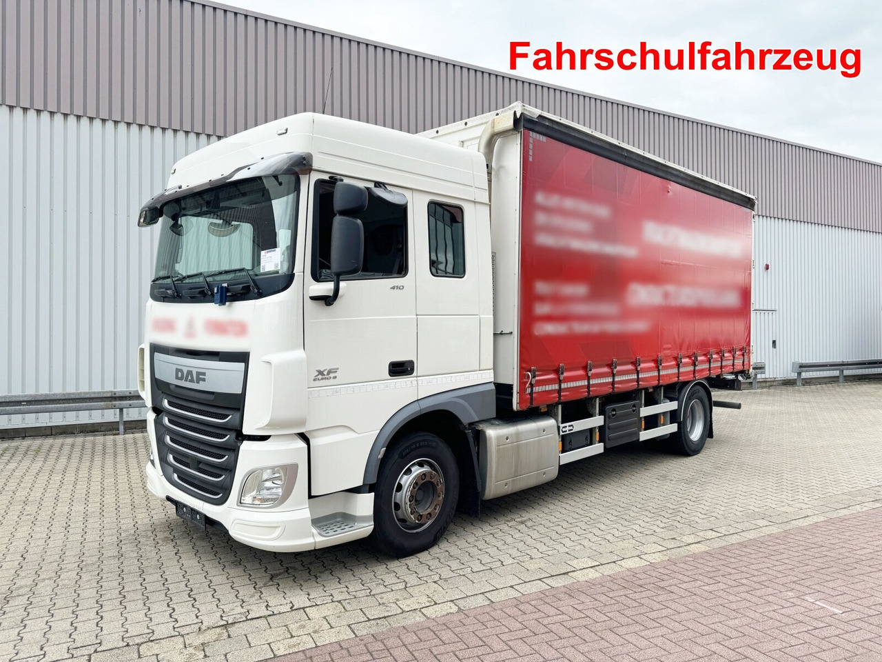 DAF XF 410 FA 4x2 XF 410 FA 4x2, Fahrschule, 2x AHK, 6 Sitze - Dropside/ Flatbed truck: picture 1 DAF XF 410 FA 4x2 XF 410 FA 4x2, Fahrschule, 2x AHK, 6 Sitze - Dropside/ Flatbed truck: picture 1