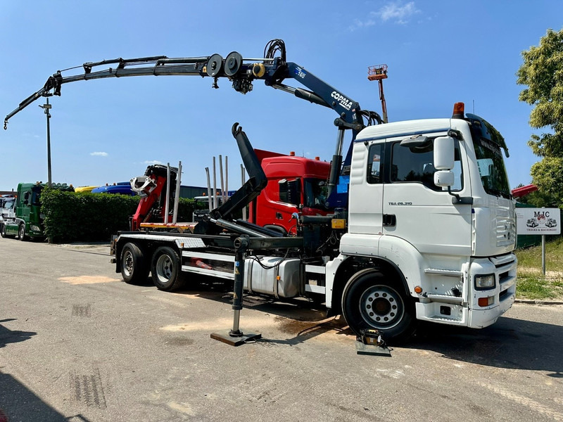 MAN TGA 26.310 6X2 HOOKLIFT + CRANE COPMA 160.4 + JIB J2 + WINCH - RADIO - LIFT + STEERING AXLE - EURO 3 - BE - Crane truck: picture 1 MAN TGA 26.310 6X2 HOOKLIFT + CRANE COPMA 160.4 + JIB J2 + WINCH - RADIO - LIFT + STEERING AXLE - EURO 3 - BE - Crane truck: picture 1