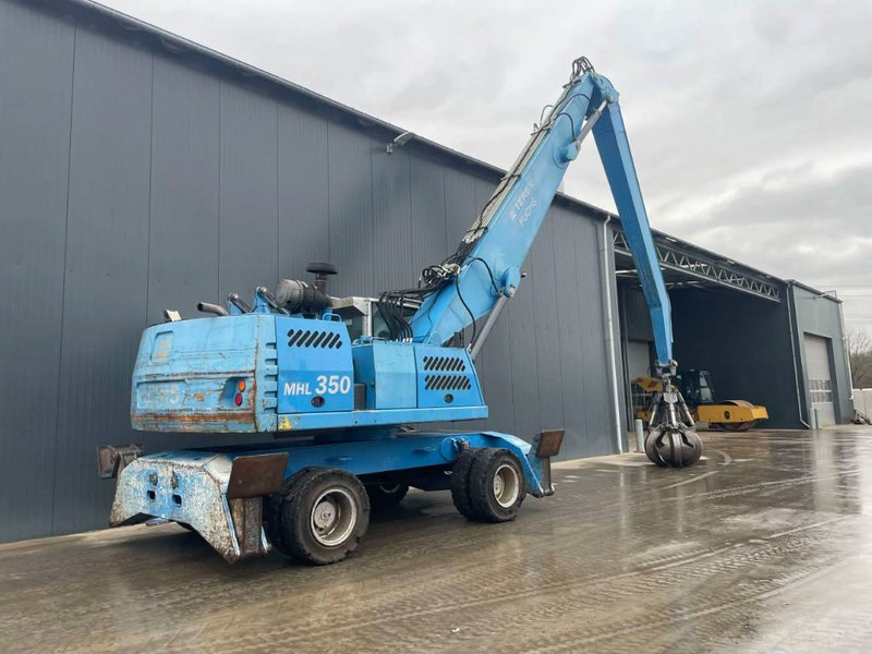 Waste/ Industry handler for transportation of garbage Fuchs MHL350: picture 5