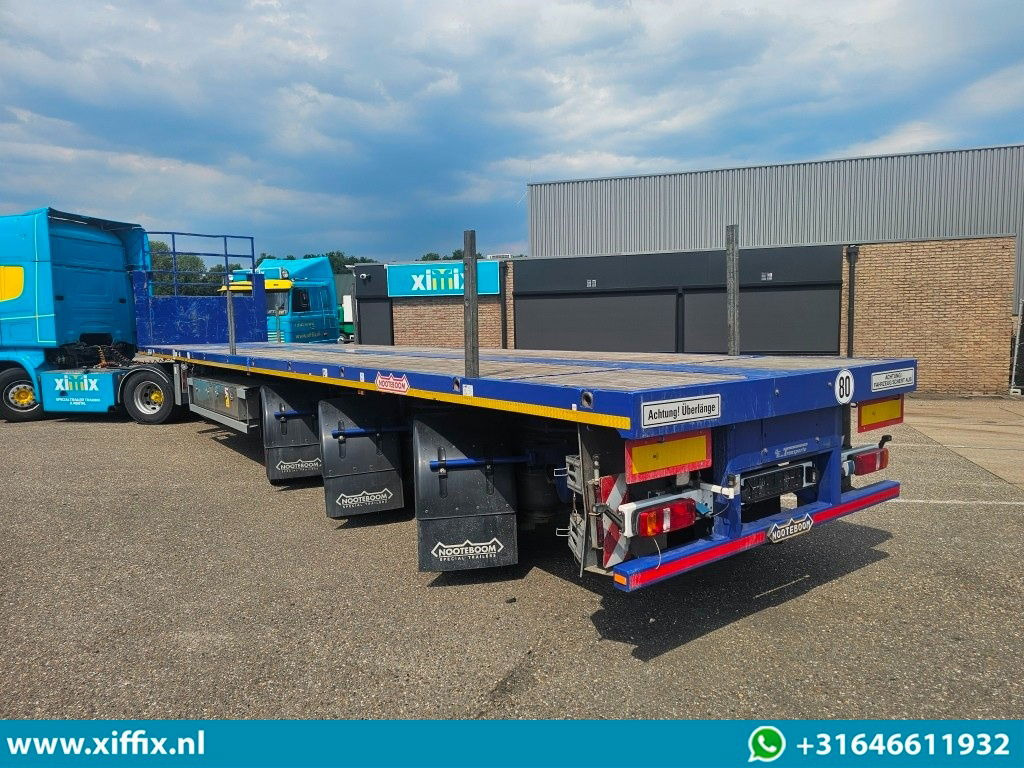 Nooteboom 3-ass. Vlakke dubbel 2x uitschuifbare oplegger / 3x gestuurd - Dropside/ Flatbed semi-trailer: picture 4 Nooteboom 3-ass. Vlakke dubbel 2x uitschuifbare oplegger / 3x gestuurd - Dropside/ Flatbed semi-trailer: picture 4