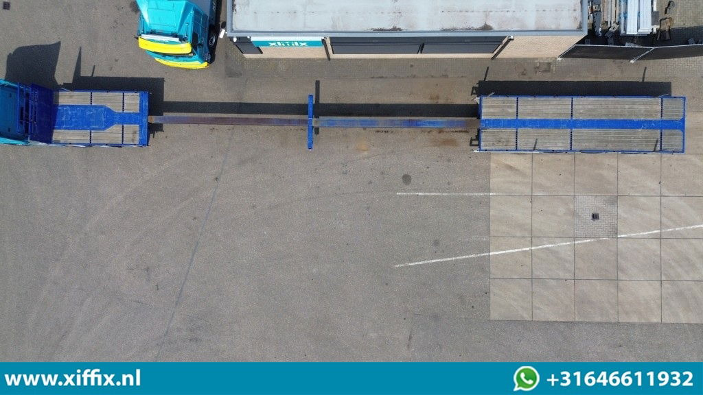 Nooteboom 3-ass. Vlakke dubbel 2x uitschuifbare oplegger / 3x gestuurd - Dropside/ Flatbed semi-trailer: picture 3 Nooteboom 3-ass. Vlakke dubbel 2x uitschuifbare oplegger / 3x gestuurd - Dropside/ Flatbed semi-trailer: picture 3