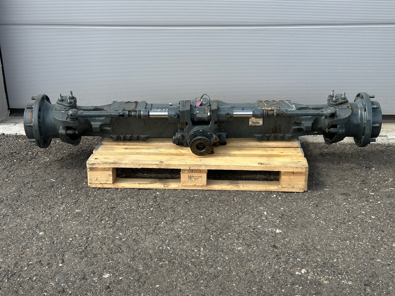 Cararro Vorderachse-Planetenachse Typ:26.25. Cararro No.595134. KramerNr.1000498658. Ratio:21/1. #1001114# - Axle and parts for Loader: picture 1 Cararro Vorderachse-Planetenachse Typ:26.25. Cararro No.595134. KramerNr.1000498658. Ratio:21/1. #1001114# - Axle and parts for Loader: picture 1