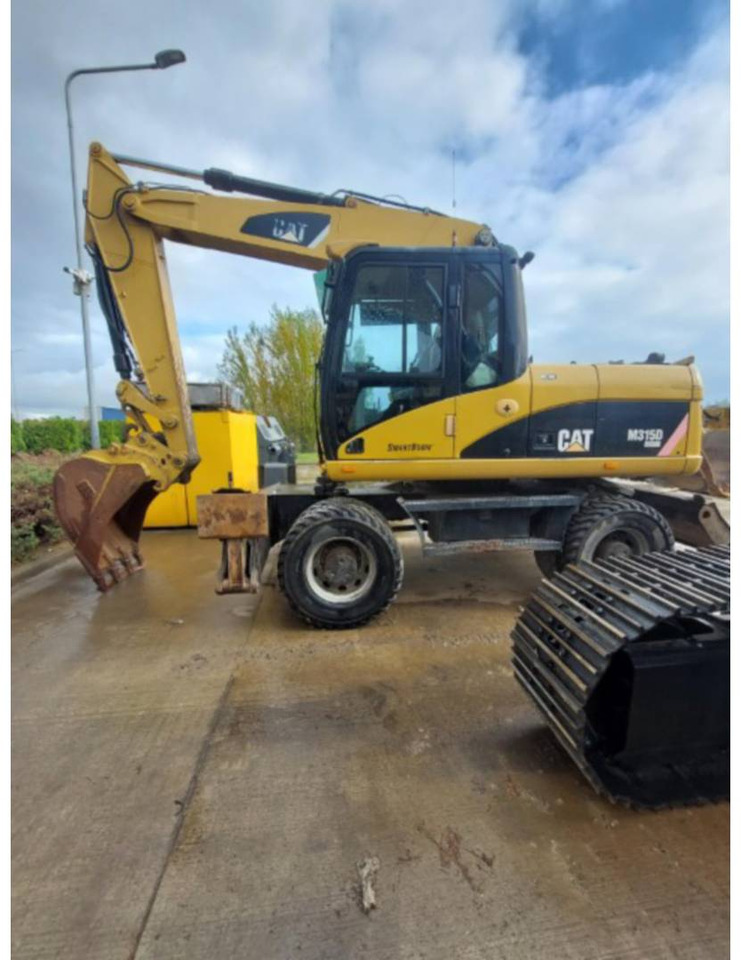 Wheel excavator CAT M315D: picture 13