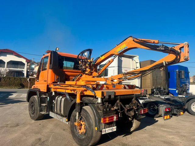 Unimog U500 4x4, Boeschungsmaehwerk Mulag - Truck: picture 1 Unimog U500 4x4, Boeschungsmaehwerk Mulag - Truck: picture 1