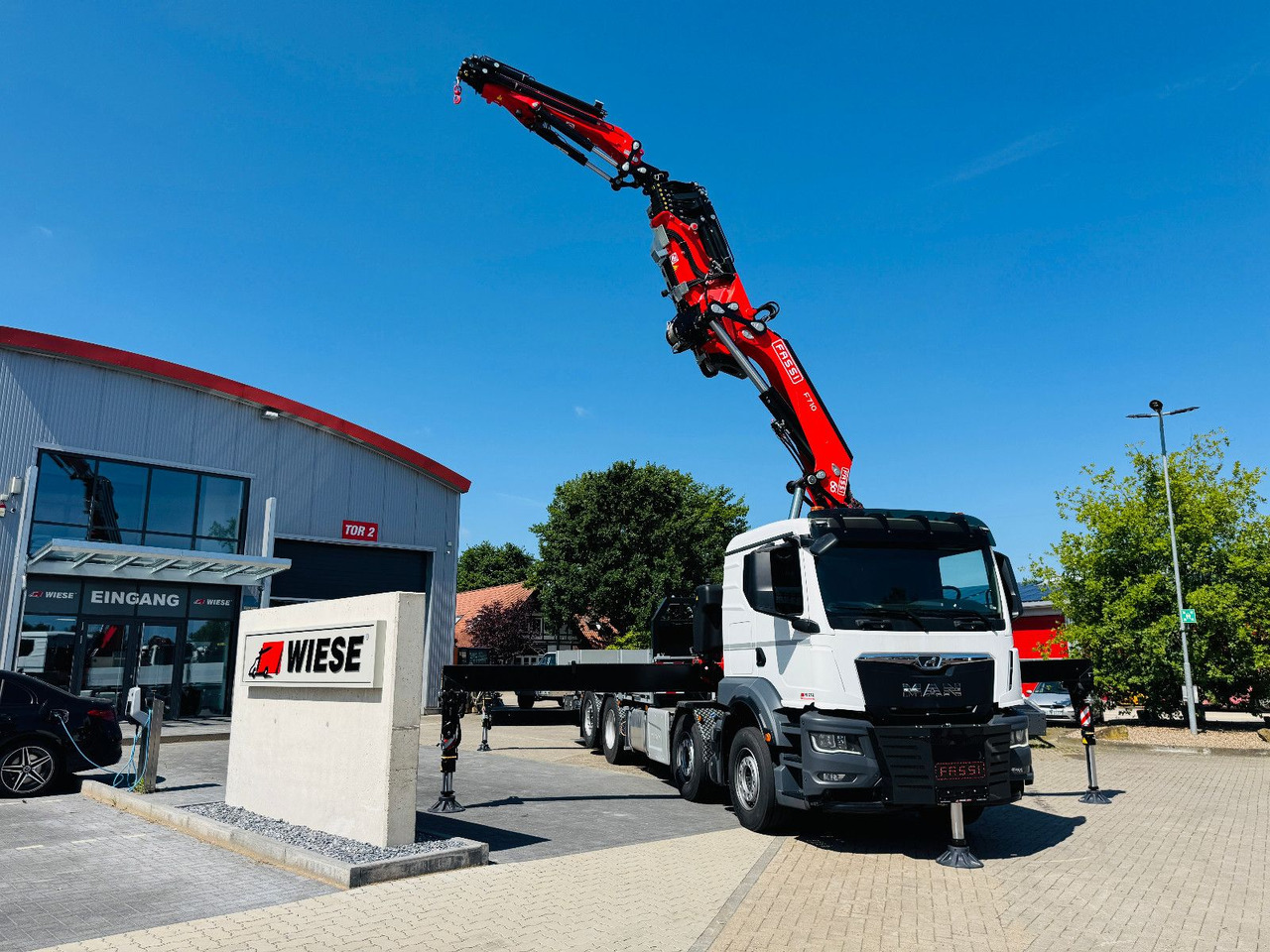MAN TGS 32.510 mit F710 Frontkran sofort - Dropside/ Flatbed truck, Crane truck: picture 1 MAN TGS 32.510 mit F710 Frontkran sofort - Dropside/ Flatbed truck, Crane truck: picture 1