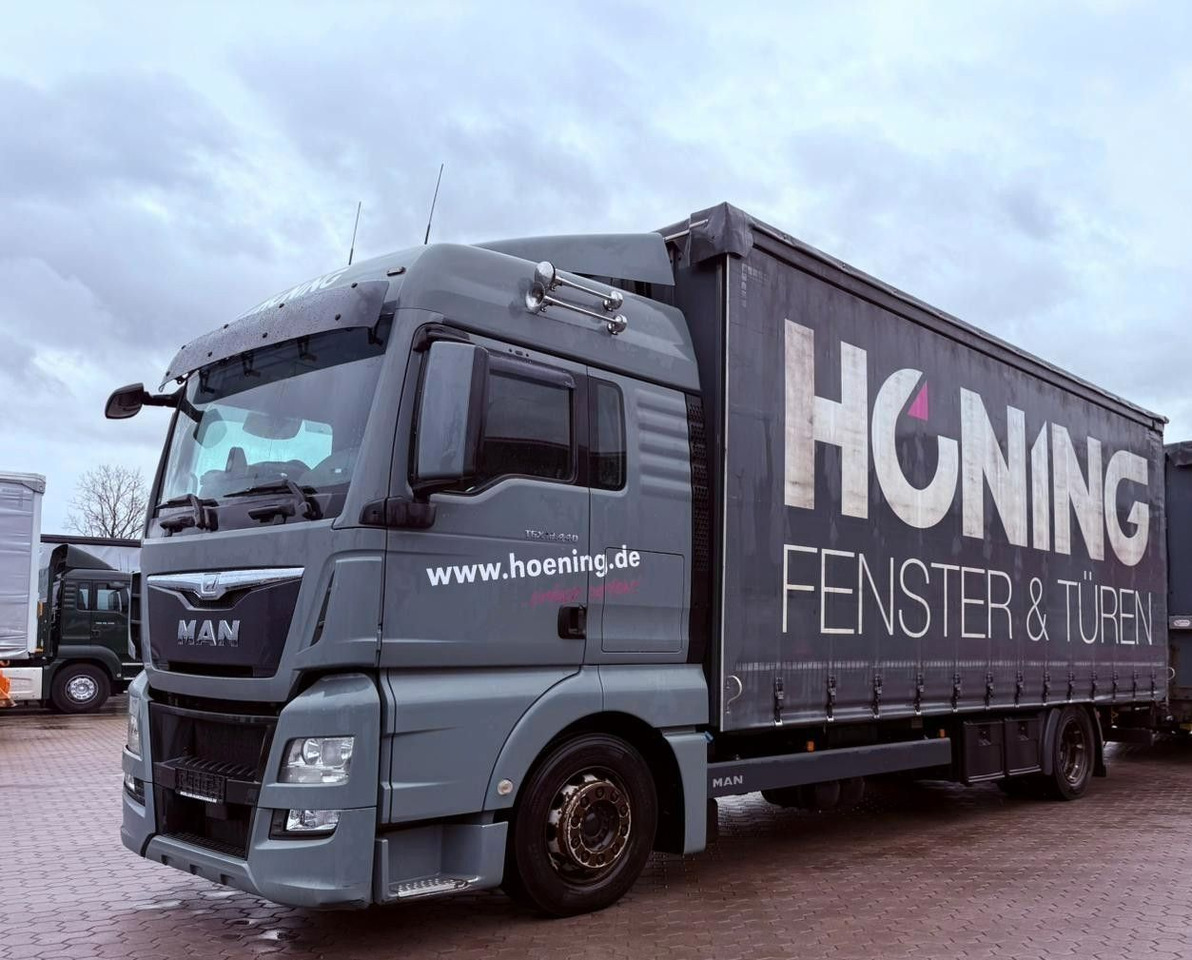MAN TGX 18.440 LL Volumen LKW mit Staplerhalterung MAN TGX 18.440 LL Volumen LKW mit Staplerhalterung - Curtainsider truck: picture 1 MAN TGX 18.440 LL Volumen LKW mit Staplerhalterung MAN TGX 18.440 LL Volumen LKW mit Staplerhalterung - Curtainsider truck: picture 1