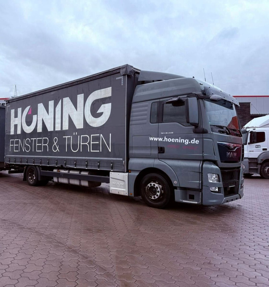 MAN TGX 18.440 LL Volumen LKW mit Staplerhalterung MAN TGX 18.440 LL Volumen LKW mit Staplerhalterung - Curtainsider truck: picture 1 MAN TGX 18.440 LL Volumen LKW mit Staplerhalterung MAN TGX 18.440 LL Volumen LKW mit Staplerhalterung - Curtainsider truck: picture 1
