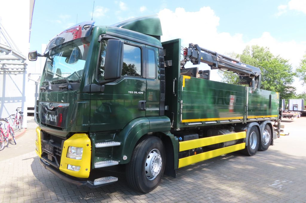 MAN TGX 26.500 6x2 - Baustoff - HIAB Kran - Dropside/ Flatbed truck, Crane truck: picture 1 MAN TGX 26.500 6x2 - Baustoff - HIAB Kran - Dropside/ Flatbed truck, Crane truck: picture 1