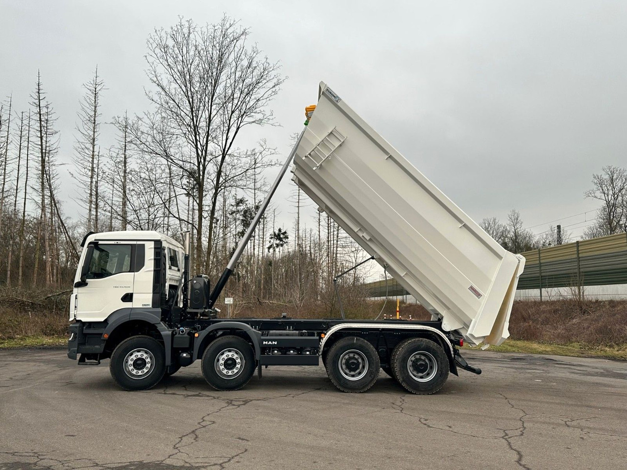 MAN TGS 41.400 8x4 / EUROMIX MTP 20m³/ EURO 5 - Skip loader truck: picture 4 MAN TGS 41.400 8x4 / EUROMIX MTP 20m³/ EURO 5 - Skip loader truck: picture 4