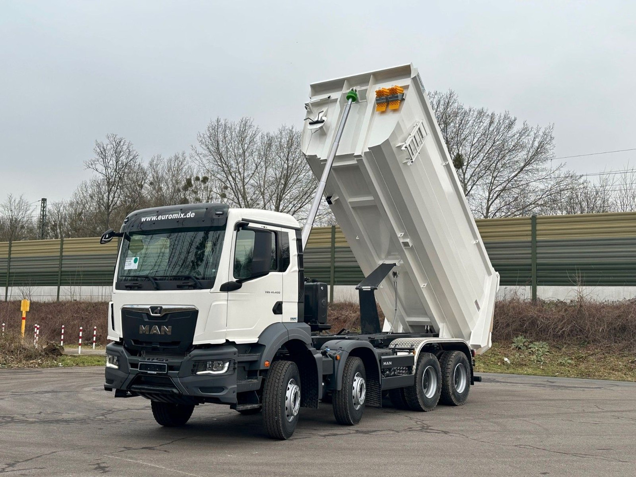 MAN TGS 41.400 8x4 / EUROMIX MTP 20m³/ EURO 5 - Skip loader truck: picture 2 MAN TGS 41.400 8x4 / EUROMIX MTP 20m³/ EURO 5 - Skip loader truck: picture 2