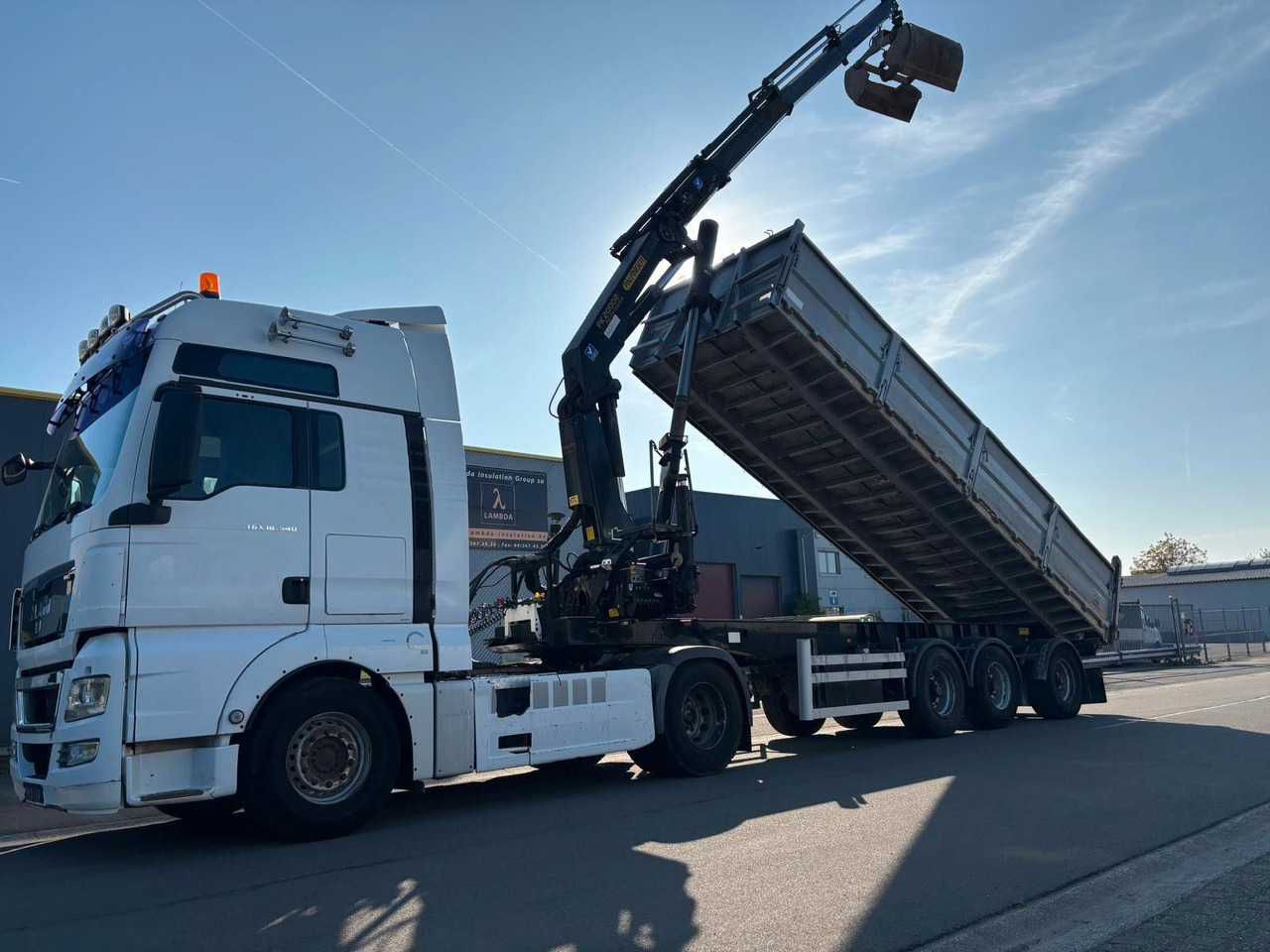 MAN TGX 18.540. Kipper + Kran PK20002. - Crane truck: picture 1 MAN TGX 18.540. Kipper + Kran PK20002. - Crane truck: picture 1
