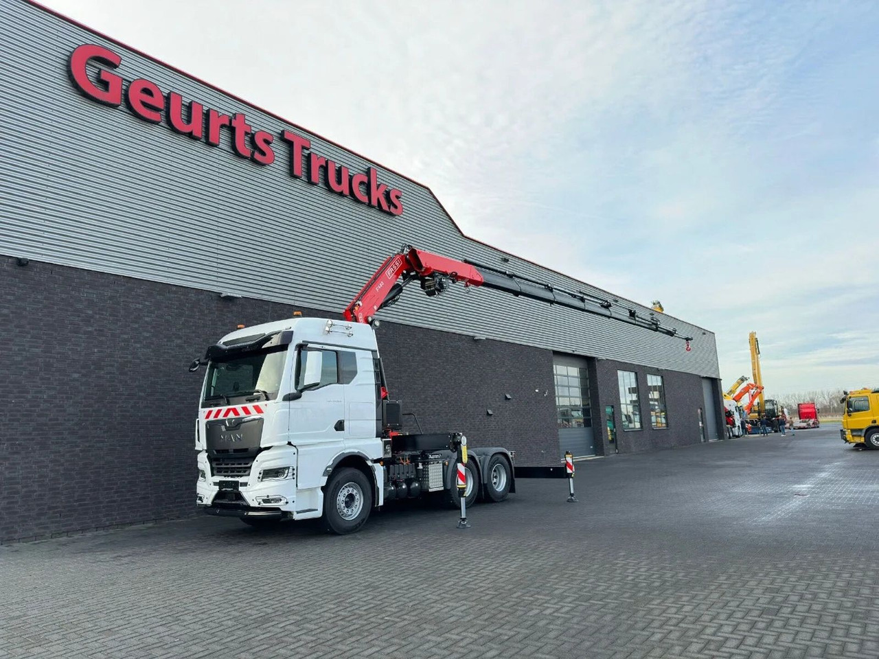 MAN TGX 33.520 6X4 TREKKER-BAKWAGEN COMBI + FASSI F4 - Crane truck: picture 2 MAN TGX 33.520 6X4 TREKKER-BAKWAGEN COMBI + FASSI F4 - Crane truck: picture 2