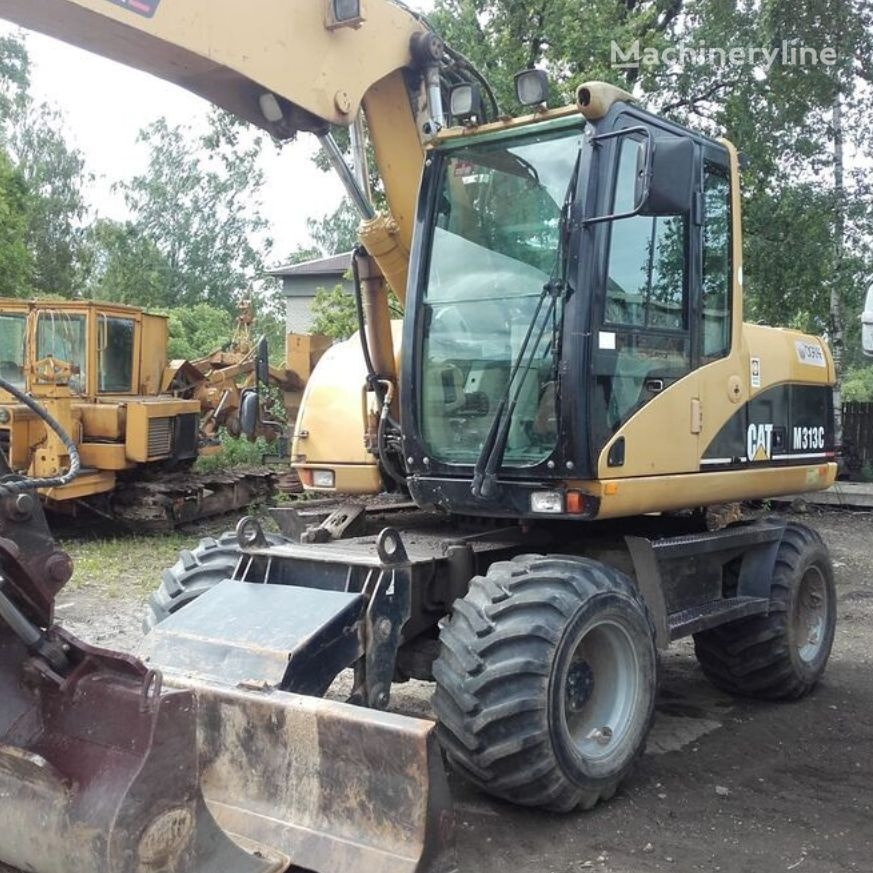 Wheel excavator Caterpillar M313C: picture 6