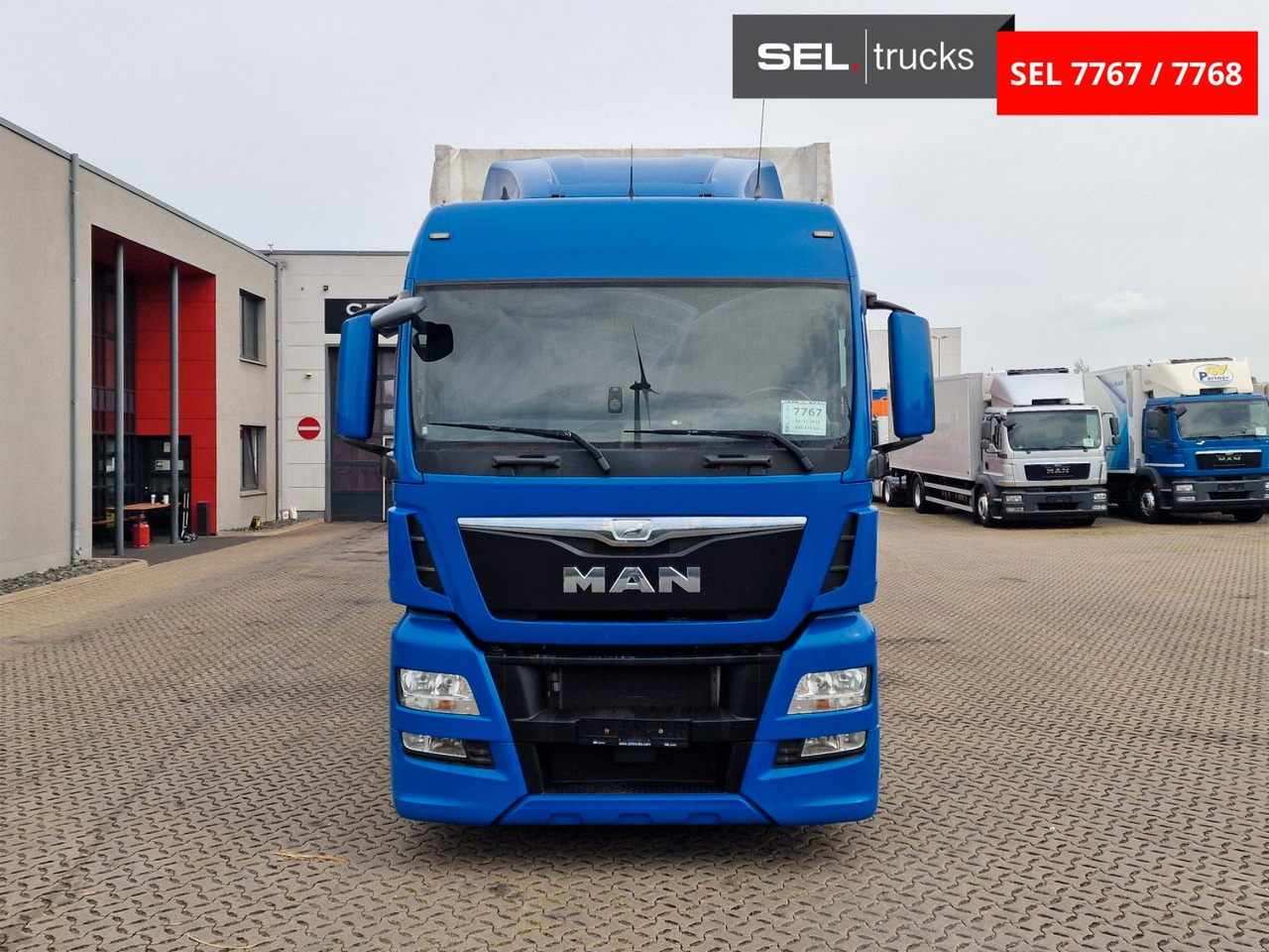 MAN TGX 18.440 4X2 LL-U /Intarder/Hubdach/Durchlade - Curtainsider truck: picture 2 MAN TGX 18.440 4X2 LL-U /Intarder/Hubdach/Durchlade - Curtainsider truck: picture 2