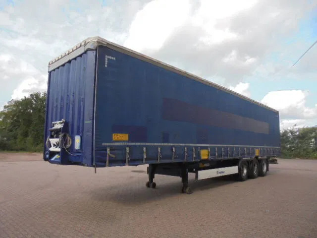 Krone SD Nl kenteken 25 in stock - Curtainsider semi-trailer: picture 1 Krone SD Nl kenteken 25 in stock - Curtainsider semi-trailer: picture 1