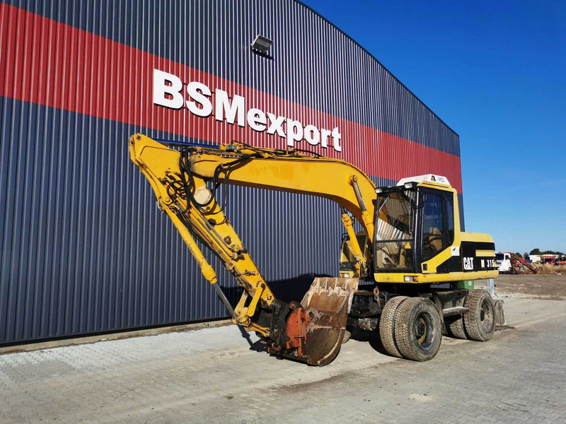 Caterpillar M315 wheel excavator - Wheel excavator: picture 2 Caterpillar M315 wheel excavator - Wheel excavator: picture 2