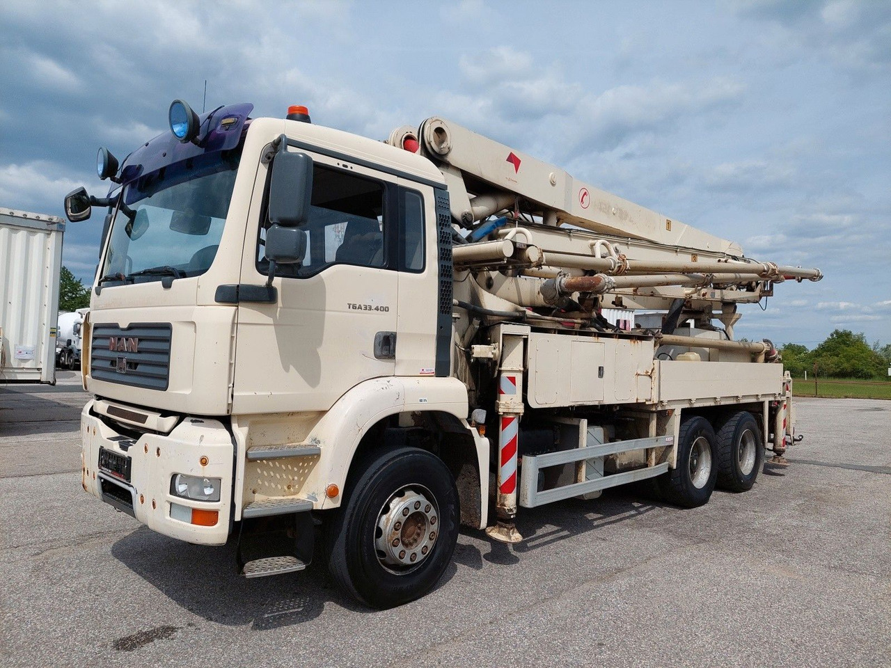 MAN TGA 33.400 6x4 BB JMBH 33 - Concrete pump truck: picture 1 MAN TGA 33.400 6x4 BB JMBH 33 - Concrete pump truck: picture 1