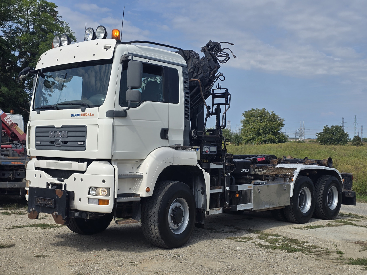 MAN TGA 26.440 6X6 / HOOK SYSTEM / HIAB 166D REMOTE - Hook lift truck, Crane truck: picture 1 MAN TGA 26.440 6X6 / HOOK SYSTEM / HIAB 166D REMOTE - Hook lift truck, Crane truck: picture 1