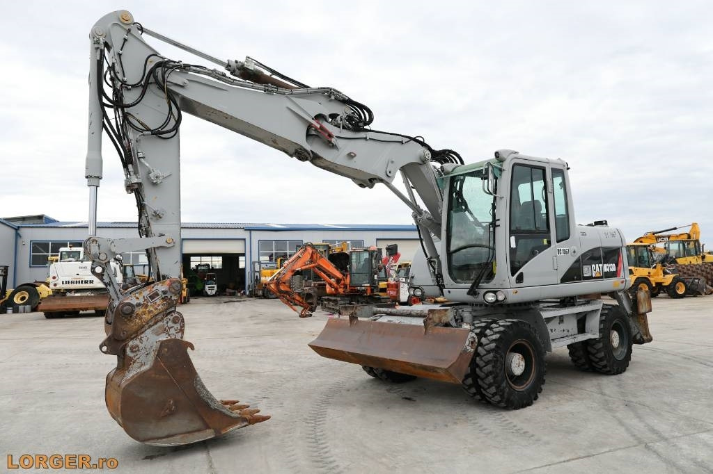 CAT M 313 D - Wheel excavator: picture 1 CAT M 313 D - Wheel excavator: picture 1