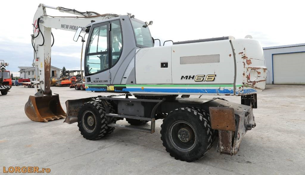 New Holland MH 6.6 + Sandvic Hammer - Wheel excavator: picture 3 New Holland MH 6.6 + Sandvic Hammer - Wheel excavator: picture 3