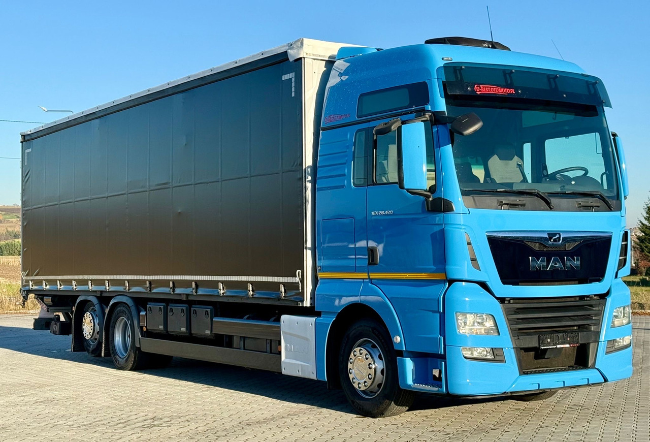 MAN TGX 26.420 / FIRANKA / WINDA / 23 EUROPALETY / 6x2 / AUTOMAT / EURO 6 / OŚ PODNOSZONA / DUŻA KABINA / 2019 ROK - Curtainsider truck: picture 1 MAN TGX 26.420 / FIRANKA / WINDA / 23 EUROPALETY / 6x2 / AUTOMAT / EURO 6 / OŚ PODNOSZONA / DUŻA KABINA / 2019 ROK - Curtainsider truck: picture 1
