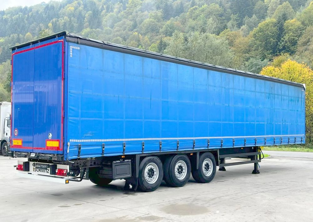 Schmitz Cargobull Firanka Standard Coilmulde // 9m // Oś podnoszona // Osie Schmitz // - Curtainsider semi-trailer: picture 1 Schmitz Cargobull Firanka Standard Coilmulde // 9m // Oś podnoszona // Osie Schmitz // - Curtainsider semi-trailer: picture 1
