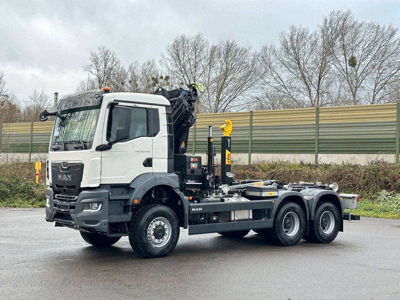 MAN TGS 33.440 6x6 BB Abrollkipper+Kran Hiab 228-6 - Hook lift truck, Crane truck: picture 3 MAN TGS 33.440 6x6 BB Abrollkipper+Kran Hiab 228-6 - Hook lift truck, Crane truck: picture 3