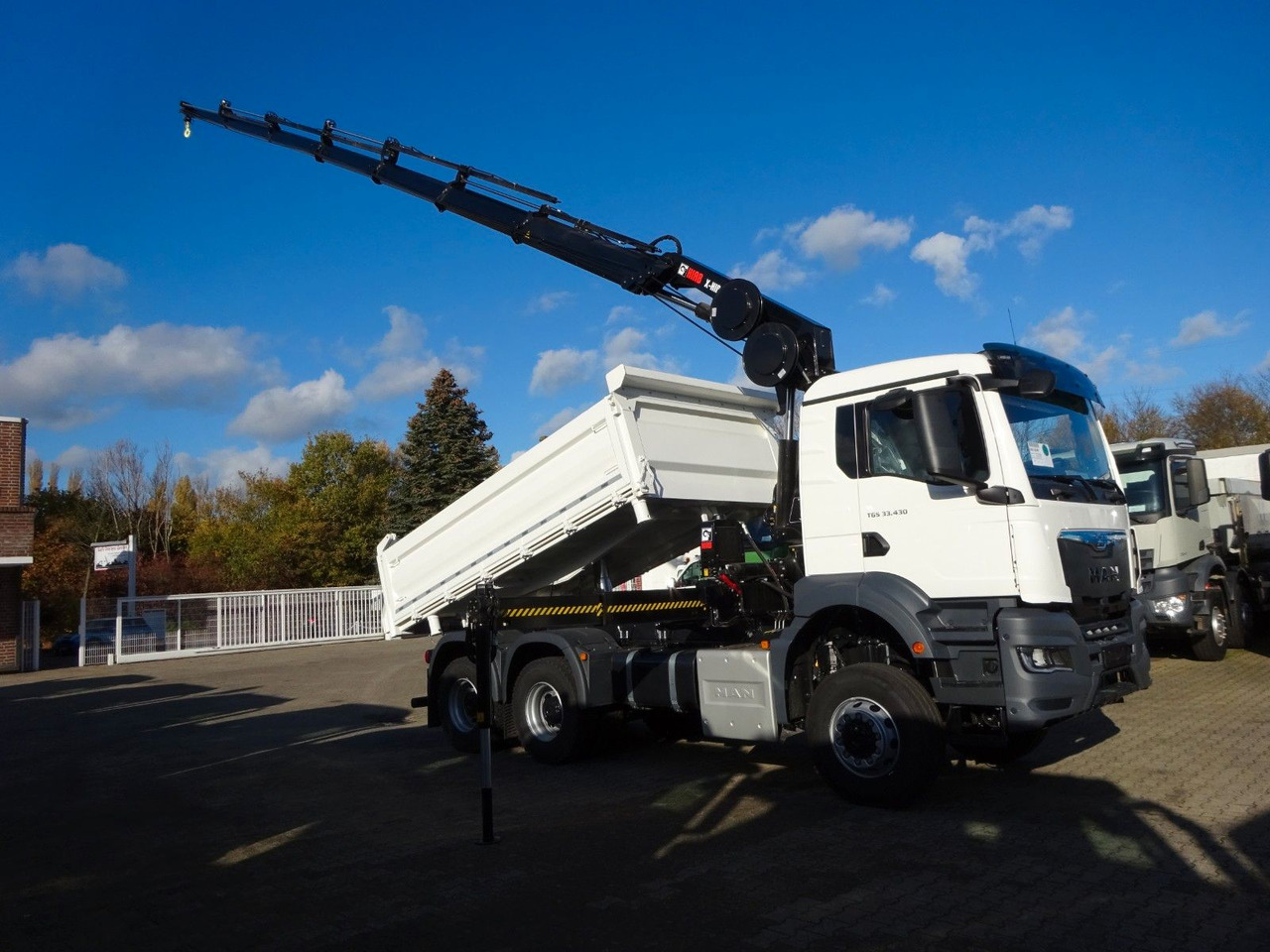 MAN 33.430 6x6 3-SEITENKIPPER KRAN HIAB 228- 6HYDRO - Tipper, Crane truck: picture 1 MAN 33.430 6x6 3-SEITENKIPPER KRAN HIAB 228- 6HYDRO - Tipper, Crane truck: picture 1