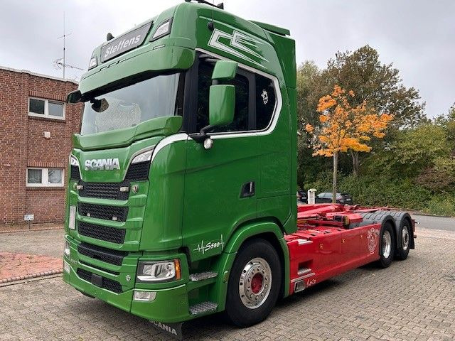 Scania S580 V8 MEILLER Abroller  mit Lift+Lenkachse 6x2 - Hook lift truck: picture 1 Scania S580 V8 MEILLER Abroller  mit Lift+Lenkachse 6x2 - Hook lift truck: picture 1