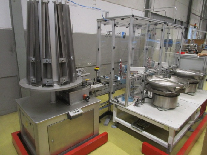 DECKEL ETIKETTIER ANLAGE SCHLEUTER GU 2 DO MIT 2xLÖFFELEINLEGESTATIONEN - Packaging machinery: picture 1 DECKEL ETIKETTIER ANLAGE SCHLEUTER GU 2 DO MIT 2xLÖFFELEINLEGESTATIONEN - Packaging machinery: picture 1