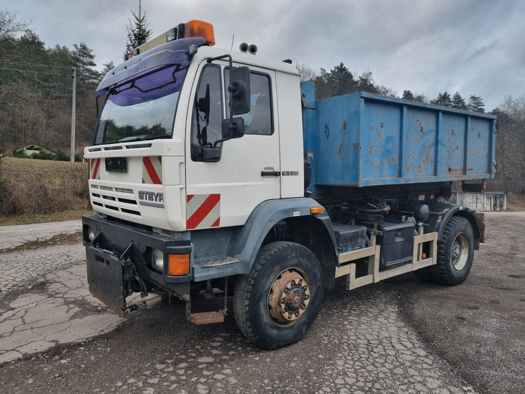 MAN (STEYR) 18.284 4x4 abrollkipper - Hook lift truck: picture 1 MAN (STEYR) 18.284 4x4 abrollkipper - Hook lift truck: picture 1