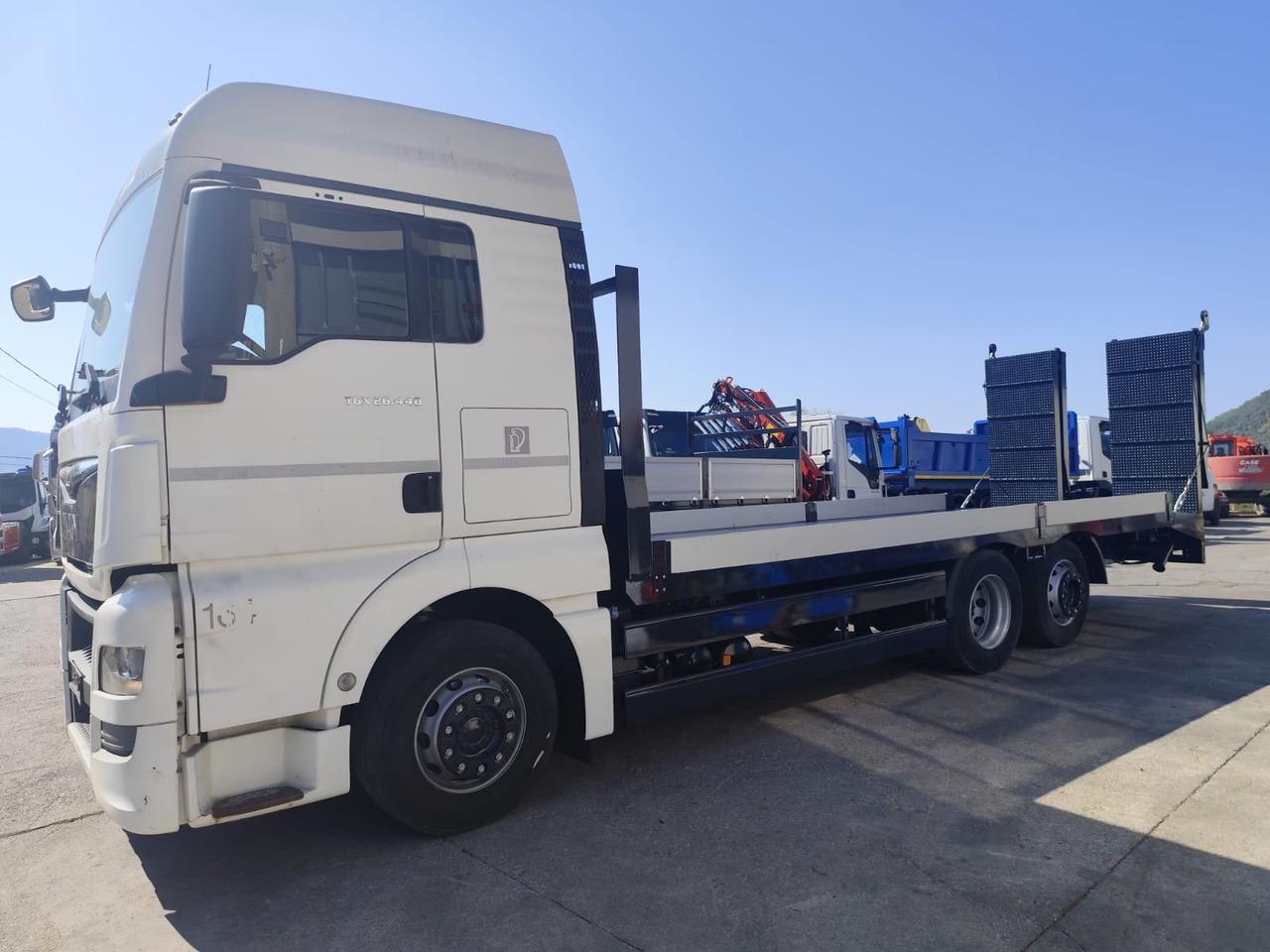 MAN TGX 26.440 - Dropside/ Flatbed truck: picture 2 MAN TGX 26.440 - Dropside/ Flatbed truck: picture 2