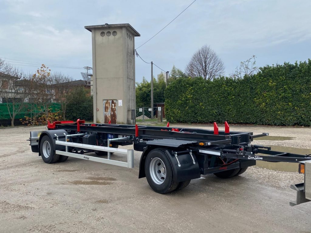 AUSTERAS RIMORCHIO NUOVO AUSTERAS SCARRABILE PNEUMATICO - Roll-off/ Skip trailer: picture 1 AUSTERAS RIMORCHIO NUOVO AUSTERAS SCARRABILE PNEUMATICO - Roll-off/ Skip trailer: picture 1