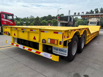 TITAN Rgn Lowboy Trailer for Sale in Zambia - Low loader semi-trailer: picture 1 TITAN Rgn Lowboy Trailer for Sale in Zambia - Low loader semi-trailer: picture 1