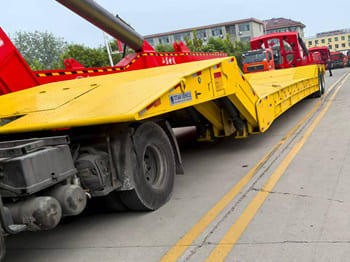 TITAN Rgn Lowboy Trailer for Sale in Zambia - Low loader semi-trailer: picture 3 TITAN Rgn Lowboy Trailer for Sale in Zambia - Low loader semi-trailer: picture 3
